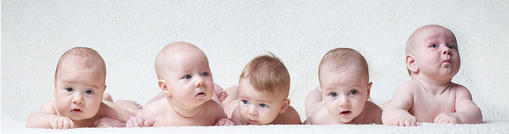 cute babies on light background